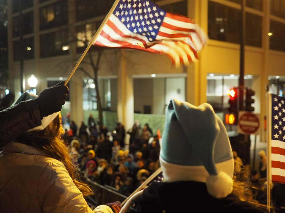 Waving flags in the Magnificent Mile Parade