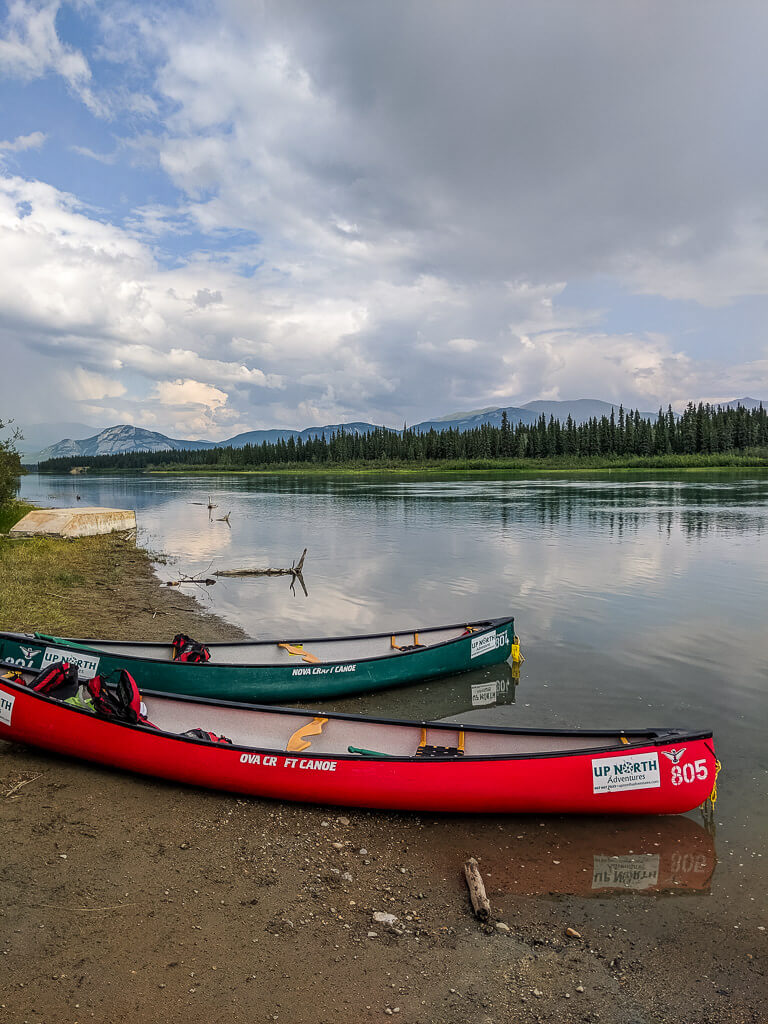 canoes on the yukon river in whitehorse