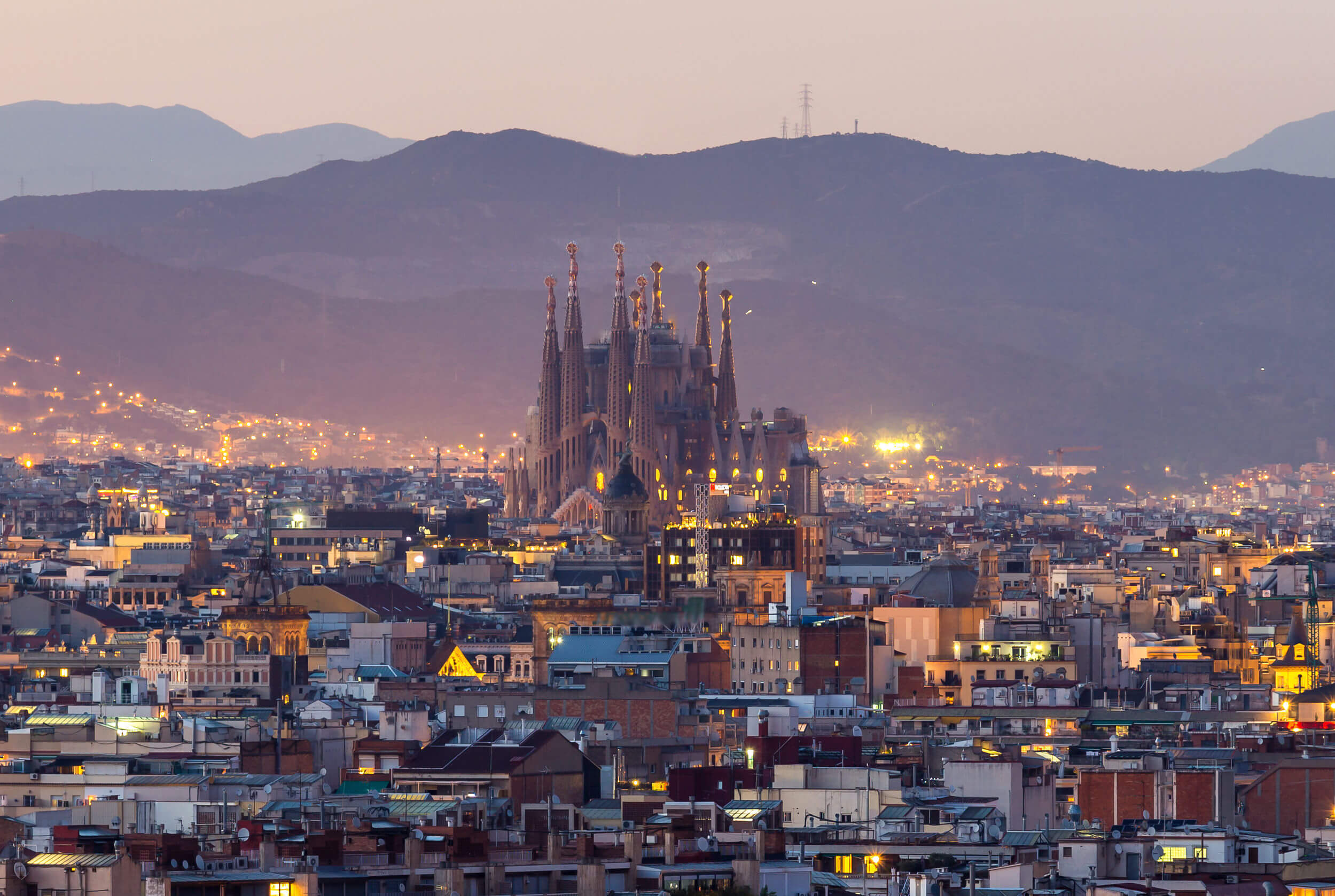 Panorama view of barcelona city and sagrada familia at dusk time,Spain