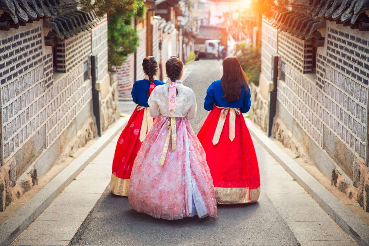 Women dressed in Traditional hanbok walking down the street