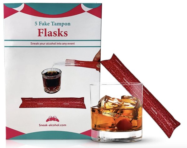 a box of fake tampons with a drink and a glass of alcohol