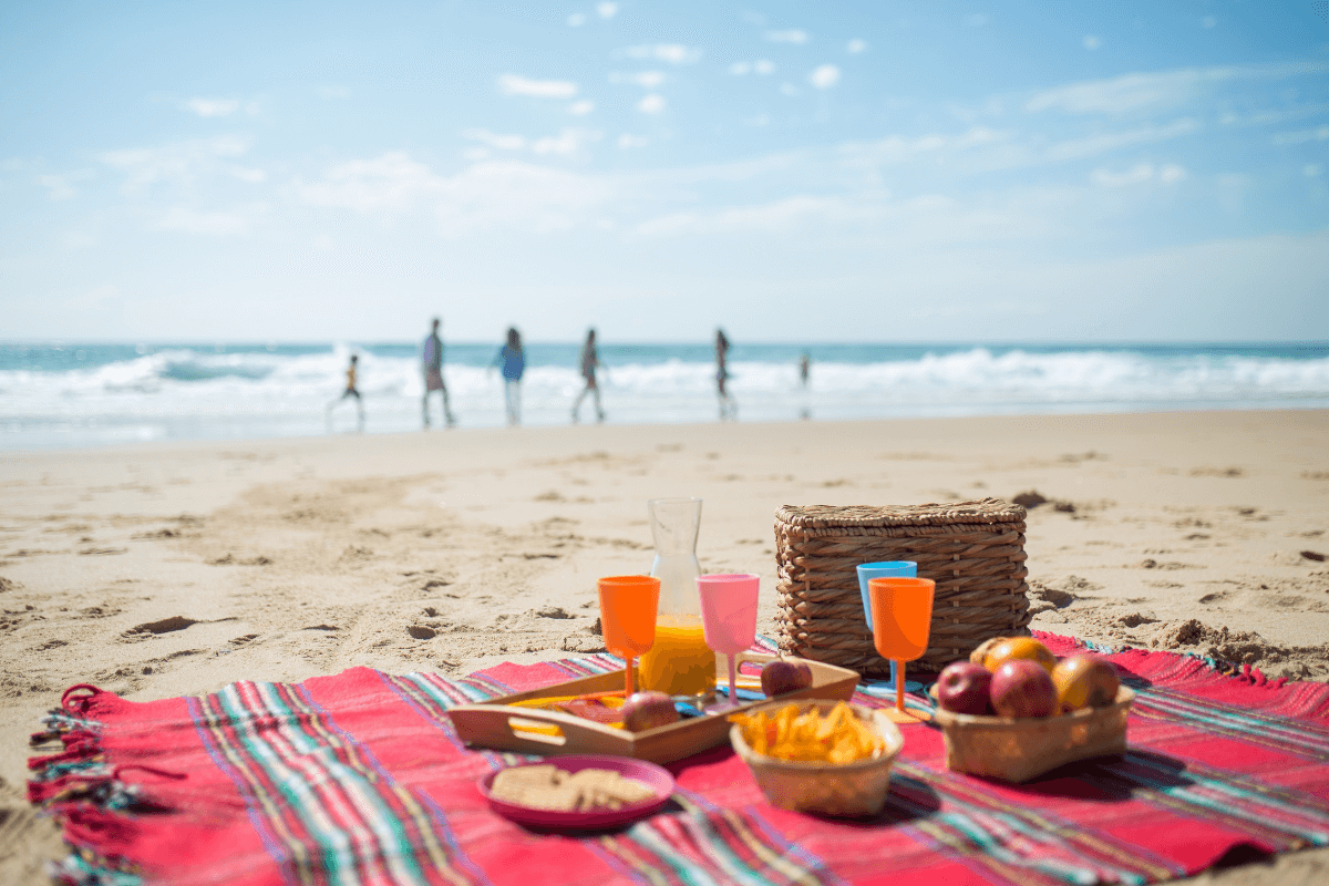 beach blanket is on a family packing list