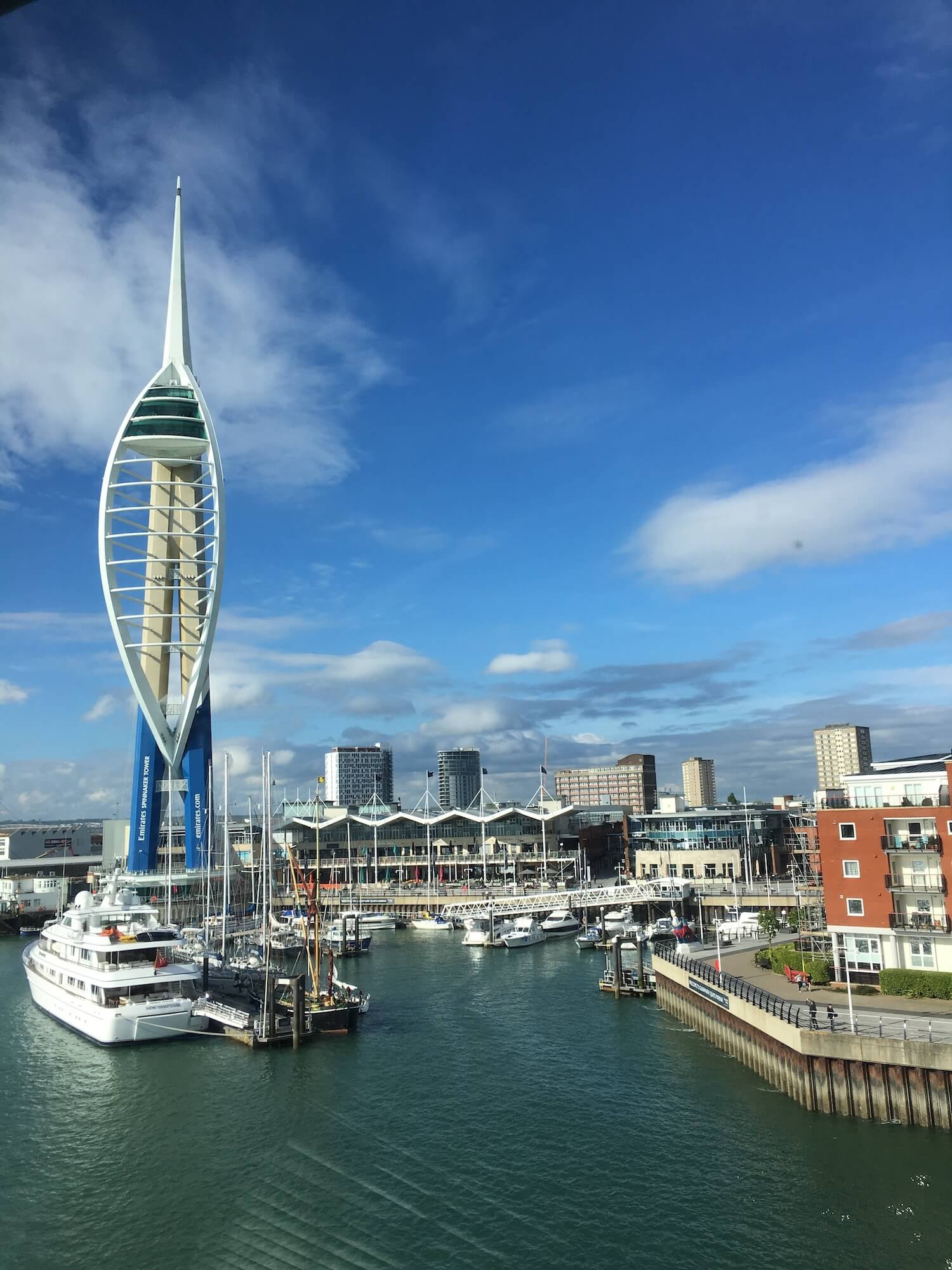 a tall tower in a harbor